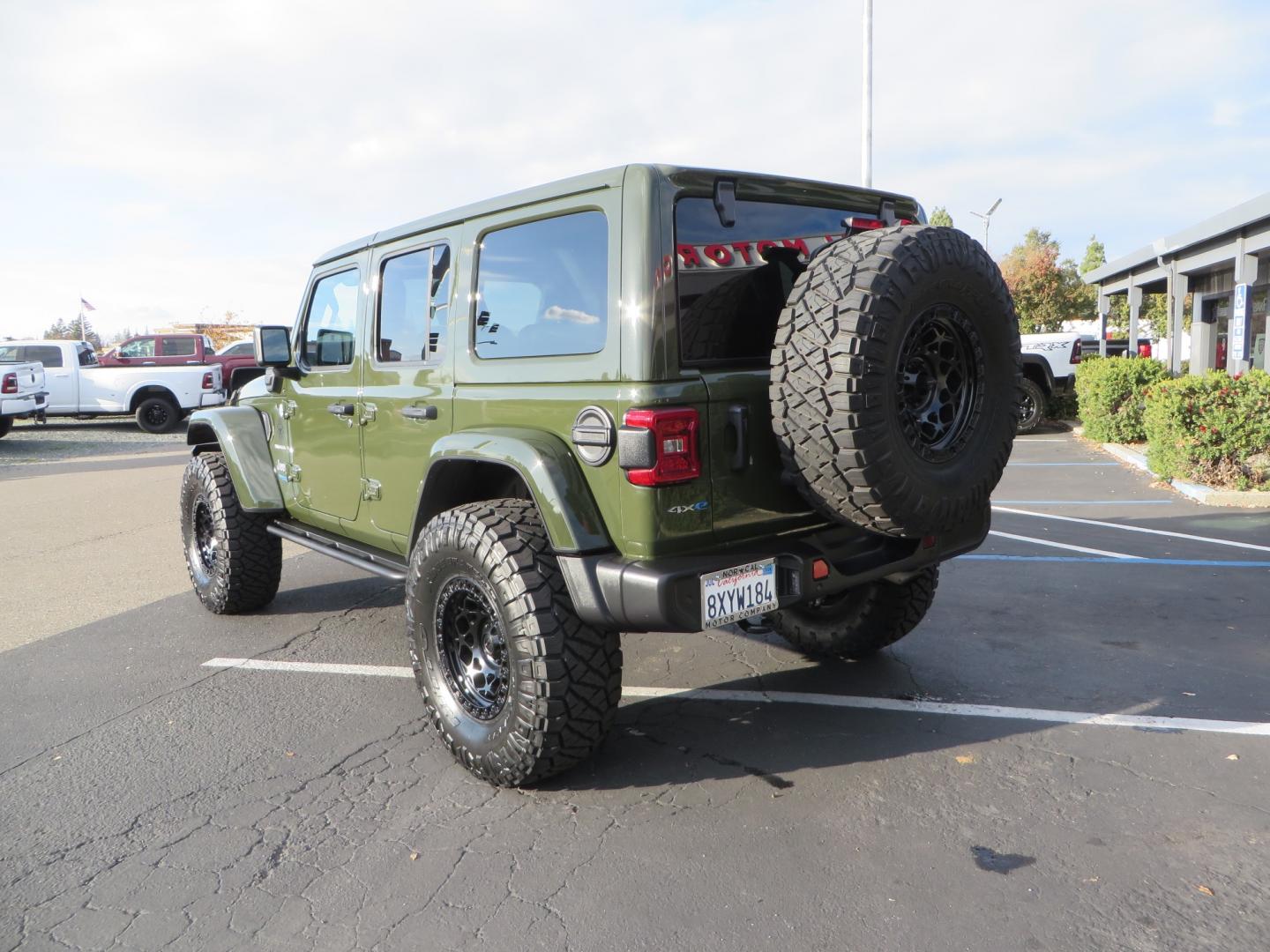 2021 Sarge Green /BLACK Jeep Wrangler Unlimited Sahara 4XE 4d SUV 4wd (1C4JJXP6XMW) with an 2.0L I4 DOHC DI Turbo PHEV engine, 8-speed Automatic transmission, located at 2630 Grass Valley Highway, Auburn, CA, 95603, (530) 508-5100, 38.937893, -121.095482 - 4XE Sahara with a Teraflex suspension system, Falcon shocks, 17" Fuel Offroad wheels, and 37" Nitto Ridge Grappler tires. - Photo#6